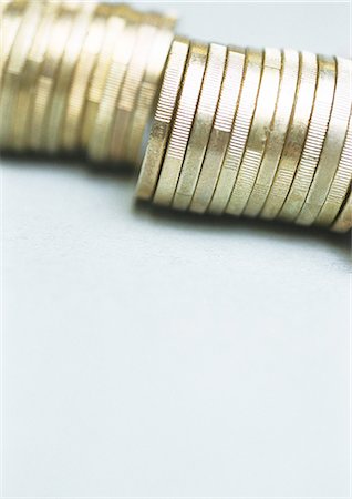 simsearch:695-05776758,k - Row of euro coins standing on edge, close-up Stock Photo - Premium Royalty-Free, Code: 695-05776757
