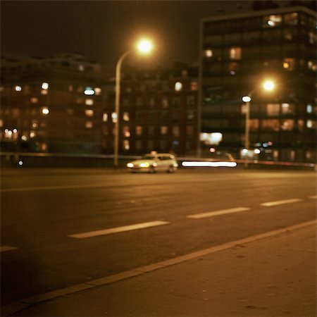 Street at night, blurred Foto de stock - Royalty Free Premium, Número: 695-05777084