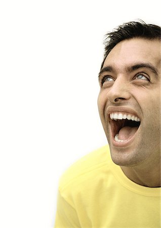 Man laughing, looking up, portrait Foto de stock - Royalty Free Premium, Número: 695-05777120