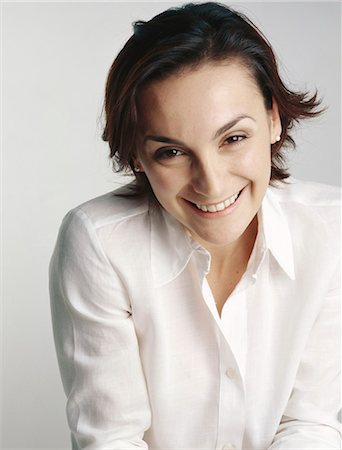 Woman smiling at camera, portrait Foto de stock - Sin royalties Premium, Código: 695-05777253