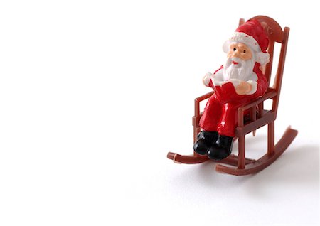 simsearch:700-02972955,k - Toy Santa Claus in rocking chair Stock Photo - Premium Royalty-Free, Code: 695-05778092