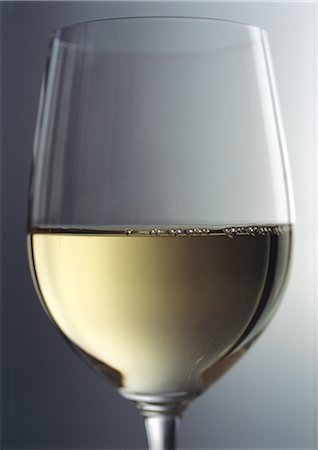 simsearch:695-05774901,k - Glass of white wine Fotografie stock - Premium Royalty-Free, Codice: 695-05778514