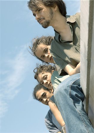 dangling teenage - Group of young people, low angle view Stock Photo - Premium Royalty-Free, Code: 695-05778573