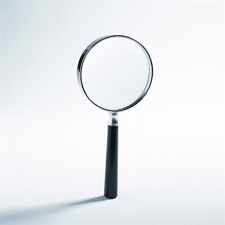 enlarged - Magnifying glass Foto de stock - Sin royalties Premium, Código: 695-05778735