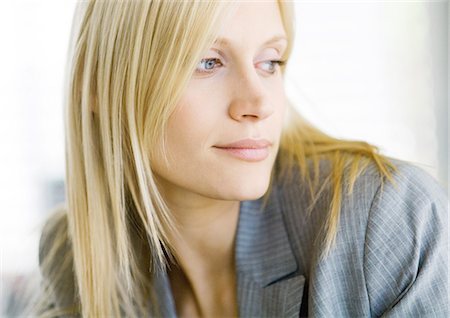portrait business person close thinking not looking at camera - Blond businesswoman looking away, portrait Stock Photo - Premium Royalty-Free, Code: 695-05778821