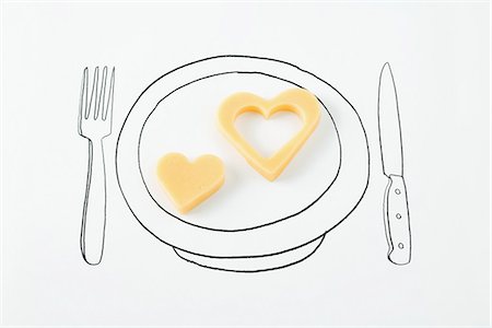 Heart-shaped cheese on drawing of plate Foto de stock - Sin royalties Premium, Código: 695-05779505