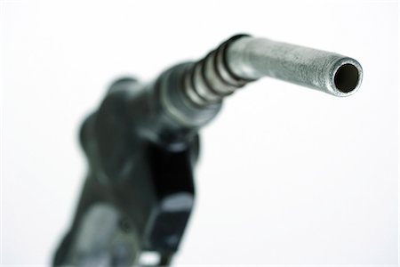 simsearch:695-05771081,k - Gas pump nozzle, close-up Stock Photo - Premium Royalty-Free, Code: 695-05779536