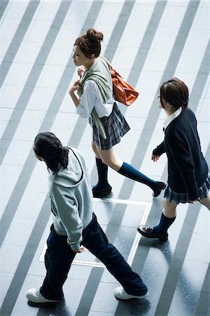 Young friends walking, high angle view Stock Photo - Premium Royalty-Free, Code: 695-05779606