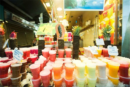 fresh food - Stacked drinks display at fresh fruit juice shop Stock Photo - Premium Royalty-Free, Code: 695-05779741