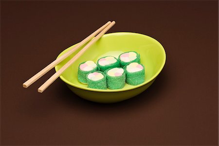 Food concept, candy rolled to look like maki sushi Stock Photo - Premium Royalty-Free, Code: 695-05779929