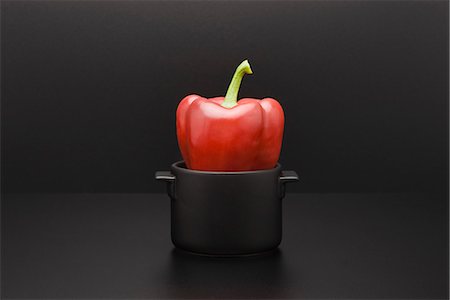 dark background vegetable - Red bell pepper in miniature pot Stock Photo - Premium Royalty-Free, Code: 695-05779940