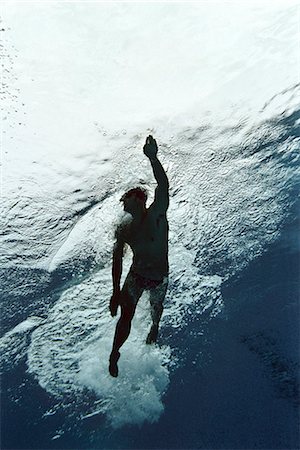 Man swimming in pool, underwater view Foto de stock - Sin royalties Premium, Código: 695-05770067