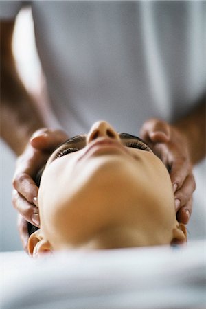 Woman receiving head massage Stock Photo - Premium Royalty-Free, Code: 695-05770250