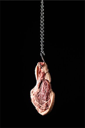 simsearch:695-05770356,k - Steak hanging from meat hook Stock Photo - Premium Royalty-Free, Code: 695-05770319