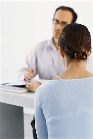 Woman answering questions for job interview Stock Photo - Premium Royalty-Free, Code: 695-05770407