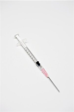 Syringe Foto de stock - Royalty Free Premium, Número: 695-05770478