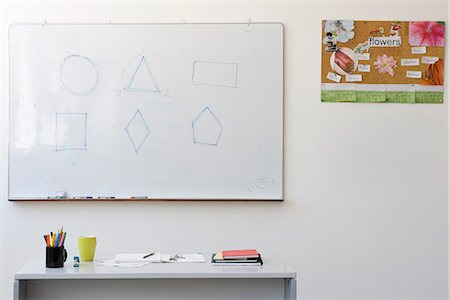 Geometric shapes on classroom whiteboard Stock Photo - Premium Royalty-Free, Code: 695-05770718
