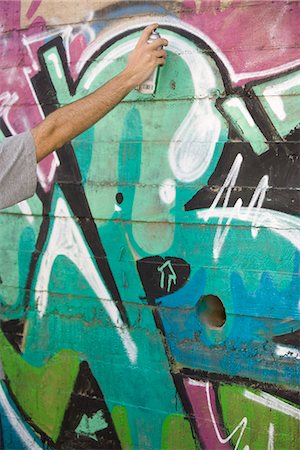 Spray painting graffiti mural Stock Photo - Premium Royalty-Free, Code: 695-05770866