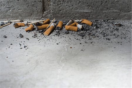 eyjafjallajokull the ash on ground - Discarded cigarette butts on ground Stock Photo - Premium Royalty-Free, Code: 695-05770887