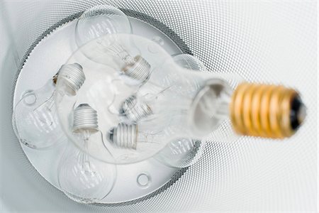 energy bulb concept - Conventional light bulbs in garbage can Stock Photo - Premium Royalty-Free, Code: 695-05770897