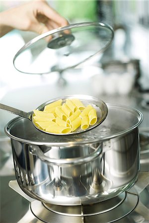 pots on a stove - Cooking pasta Stock Photo - Premium Royalty-Free, Code: 695-05770934