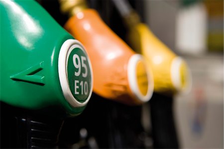Gas pump nozzles in a row Foto de stock - Sin royalties Premium, Código: 695-05771040