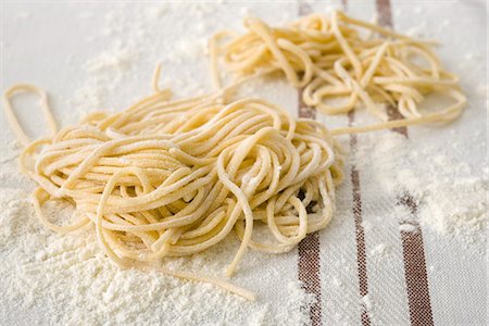 Fresh homemade spaghetti Stock Photo - Premium Royalty-Free, Code: 695-05771089