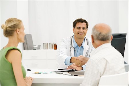 doctor patient shake hands - Doctor with senior patient providing medical consultation Stock Photo - Premium Royalty-Free, Code: 695-05771264