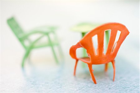 plastic toys - Miniature plastic chairs Stock Photo - Premium Royalty-Free, Code: 695-05771437