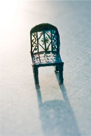 simsearch:614-06312095,k - Miniature plastic chair Foto de stock - Sin royalties Premium, Código: 695-05771440