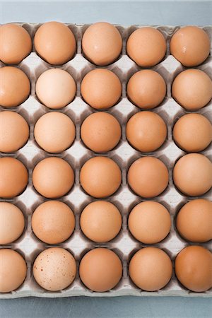 Fresh brown eggs Foto de stock - Sin royalties Premium, Código: 695-05771469