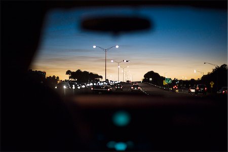 street sign - Driving at dusk Stock Photo - Premium Royalty-Free, Code: 695-05771629