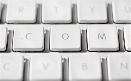 site - Letters spelling ".com" on computer keyboard Stock Photo - Premium Royalty-Free, Code: 695-05771645