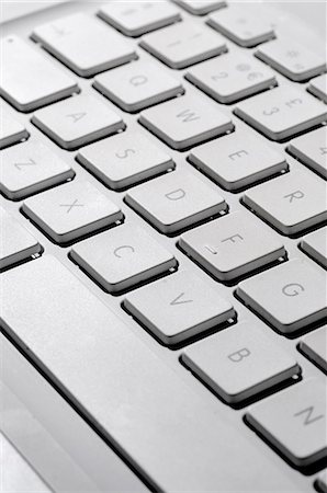 Laptop computer keyboard, close-up Fotografie stock - Premium Royalty-Free, Codice: 695-05771658