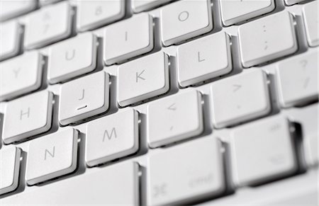 email white background - Laptop computer keyboard, close-up Stock Photo - Premium Royalty-Free, Code: 695-05771661