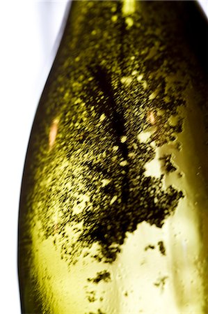 Sediment remaining in empty wine bottle Stock Photo - Premium Royalty-Free, Code: 695-05771711