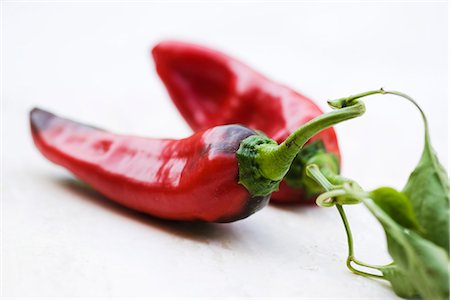 stem (botanical) - Red chili peppers Stock Photo - Premium Royalty-Free, Code: 695-05771777