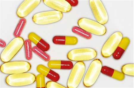 Variety of pills in capsule form Foto de stock - Sin royalties Premium, Código: 695-05771885
