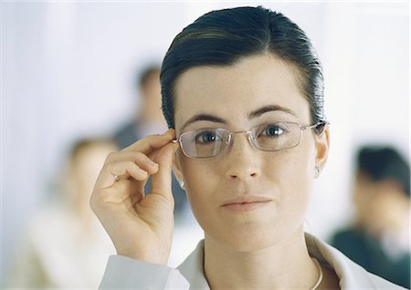 simsearch:614-07652551,k - Young businesswoman wearing glasses Stock Photo - Premium Royalty-Free, Code: 695-05771903