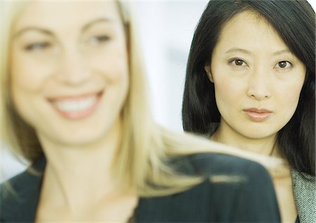 Two businesswomen, close-up Stock Photo - Premium Royalty-Free, Code: 695-05771956