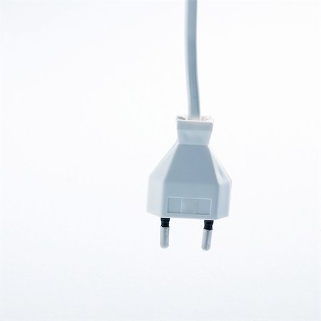 simsearch:700-00158286,k - Plug hanging Foto de stock - Sin royalties Premium, Código: 695-05772122