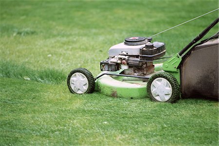 Mowing grass Stock Photo - Premium Royalty-Free, Code: 695-05772258