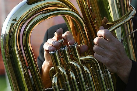people playing brass instruments - Person playing tuba, extreme close-up Stock Photo - Premium Royalty-Free, Code: 695-05772393