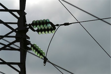 Electrical cables and pylon, close-up Foto de stock - Sin royalties Premium, Código: 695-05772402