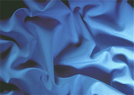 silk curtain - Folds in blue fabric, close-up, full frame Stock Photo - Premium Royalty-Free, Code: 695-05772854