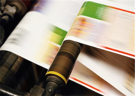 Paper on printing press, close up, blurred motion Stock Photo - Premium Royalty-Free, Code: 695-05772908