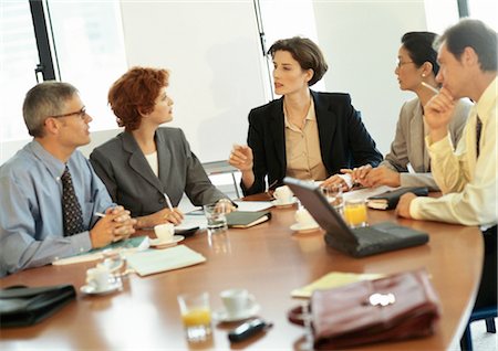 Group of business people in conference room Fotografie stock - Premium Royalty-Free, Codice: 695-05772966
