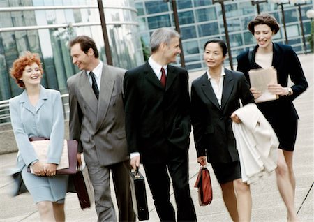 simsearch:695-05770005,k - Group of business people walking side by side Fotografie stock - Premium Royalty-Free, Codice: 695-05772963