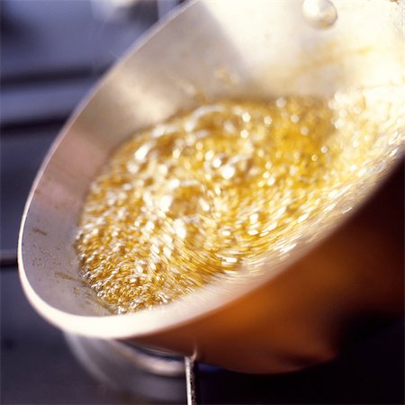 pan recipe ingredients - Close-up of caramel bubbling in pan Stock Photo - Premium Royalty-Free, Code: 695-05773476