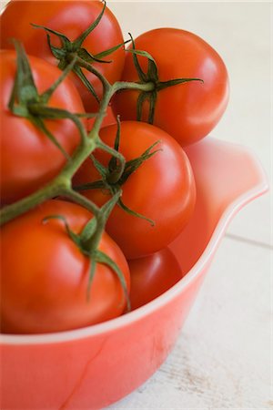 stem vegetable - Ripe vine tomatoes in bowl Stock Photo - Premium Royalty-Free, Code: 695-05780085